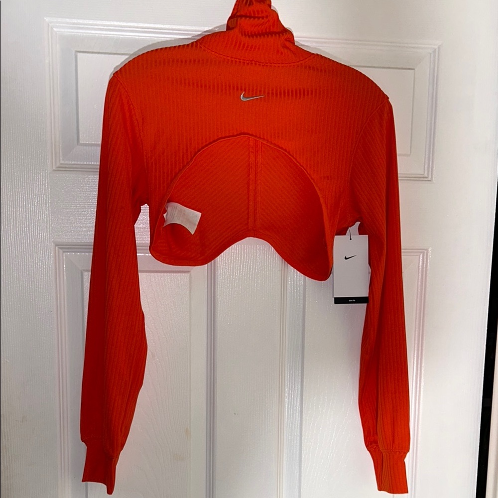 Nike Red Crop Top with Cut Out Design. Small hole next to Nike Logo.
